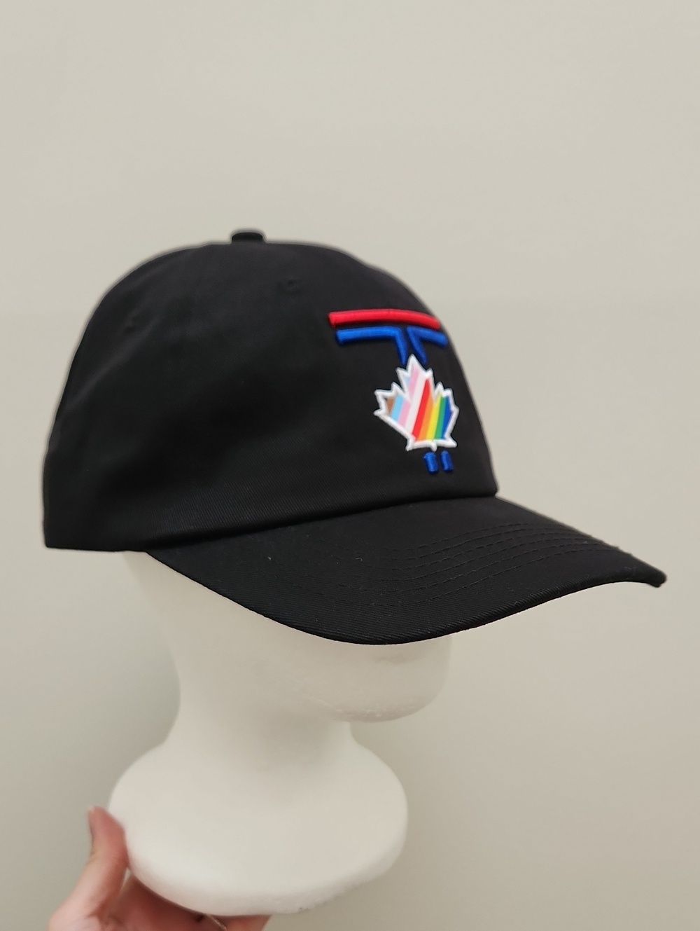 Blue Jays Black Baseball Cap with Rainbow Colored Maple Leaf - Pride Fan Giveawa